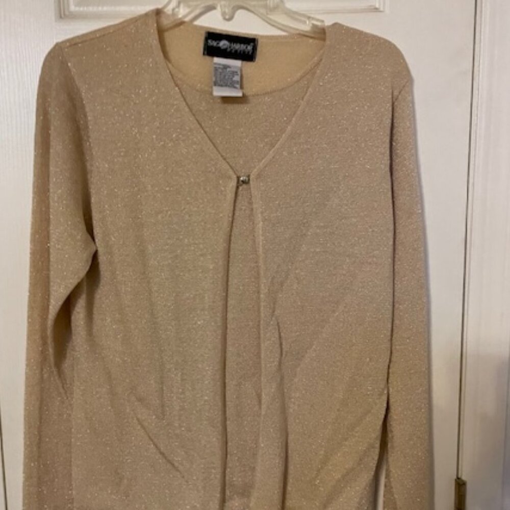 Vintage sparkly fabric top that has a shell attached to i